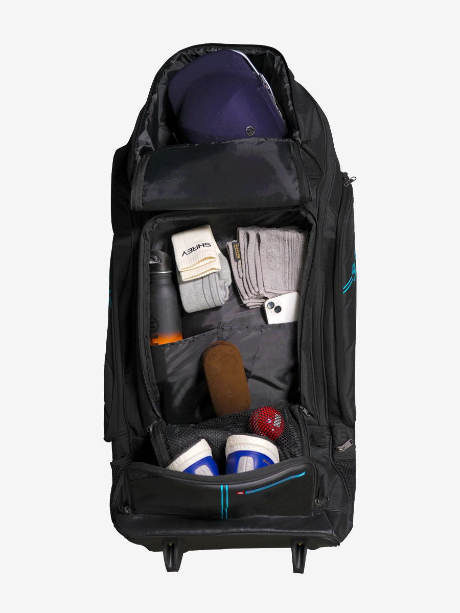 https://ik.imagekit.io/vyka3olhl/uk/e7781bb9-e957-4b93-a5bd-84f31e4f2a92/black/SHREY_META_DUFFLE_WHEELIE_120_3069_BLACK_6_HD_poNBFISTEa.webp